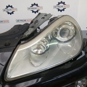FAROL ESQUERDO PRETO PORSCHE CAYENNE TIPTRONIC S D ANO: 2009